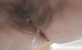 Hairy babe peeing and shitting