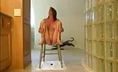 Shitting from a wooden chair