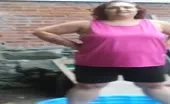 Brunette masked teen shits in yoga pants