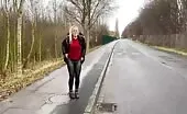 She's pooping outdoor