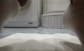 Shitting between her legs