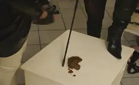 Masked babe forced slave to eat shit